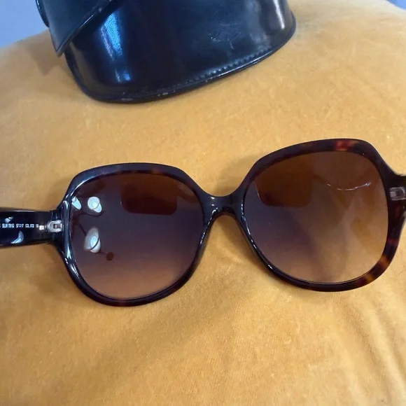 Loewe Dark Brown Sunglasses with Sleek Black Case